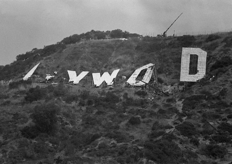 Hollywood sign with political fundraising event in foreground