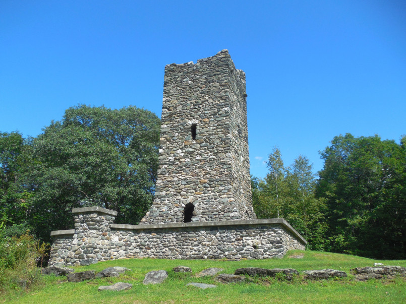 Stone observation tower in Hubbard Park with fall foliage