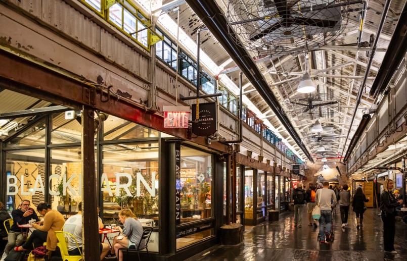 Chelsea Market New York City interior food hall Interior view of Chelsea Market showing food vendors and historic industrial architecture