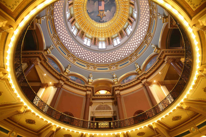 Iowa State Capitol's central gold-leafed dome rising 275 feet with its smaller surrounding domes