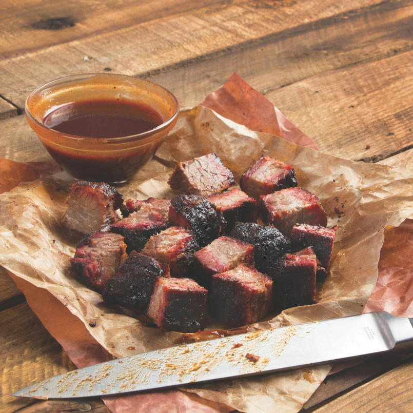 Kansas city barbecue burnt ends A plate of charred, cubed burnt ends from a Kansas City barbecue restaurant