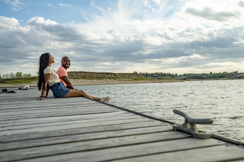 Recreational boats on Lake Sakakawea with rolling prairie hills in background