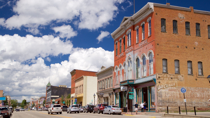 Victorian-era commercial buildings on Leadville's main street with Rocky Mountains in background