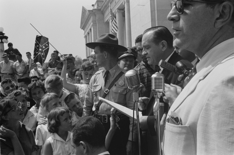 The Little Rock Nine students being escorted by federal troops during school integration