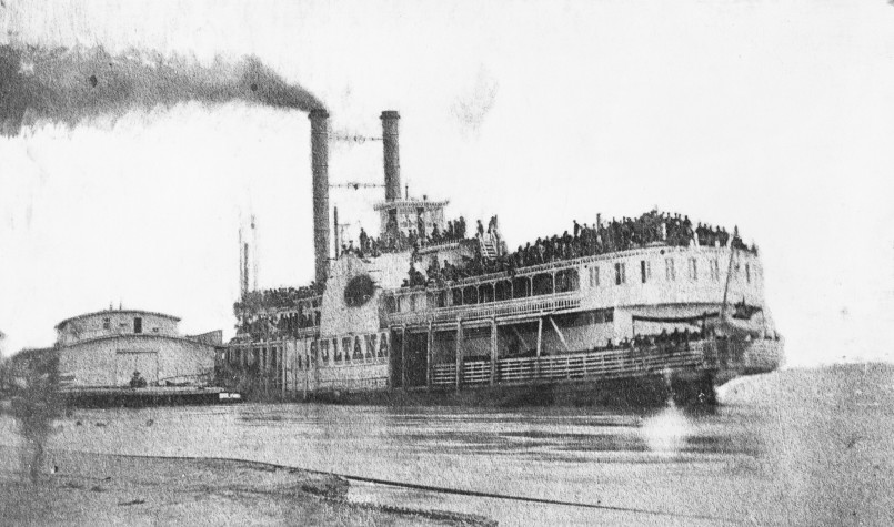 Mississippi river steamboat 1850s A large paddlewheel steamboat loaded with cargo navigating the Mississippi River in the mid-19th century