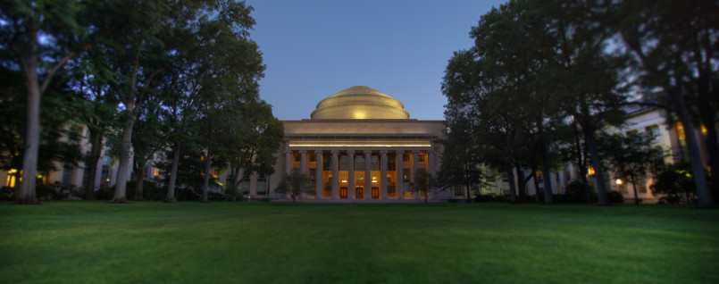 MIT's iconic Great Dome and campus buildings along the Charles River
