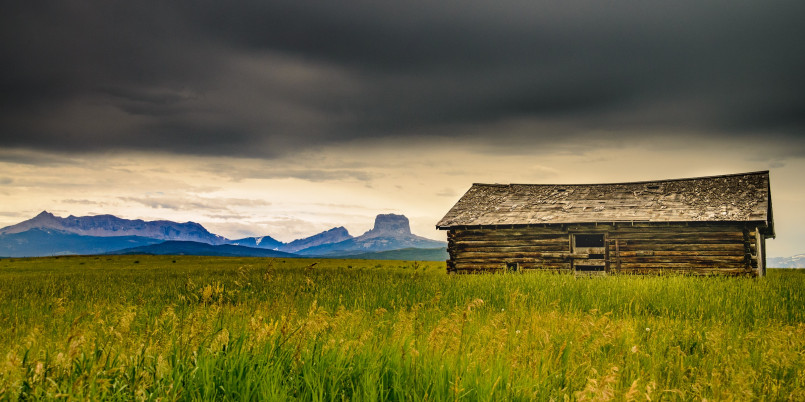 Montana landscape rural Montana rural landscape with mountains in the background and open grasslands