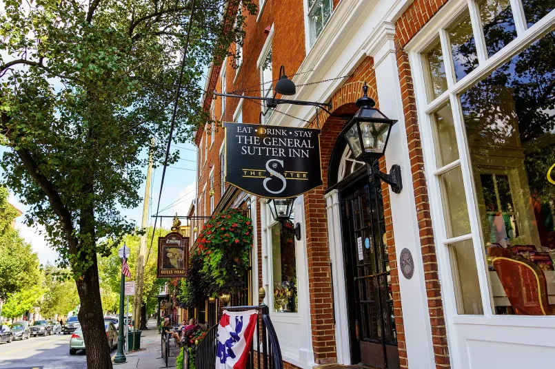 Colonial-era Moravian stone buildings surrounding a church square in Lititz