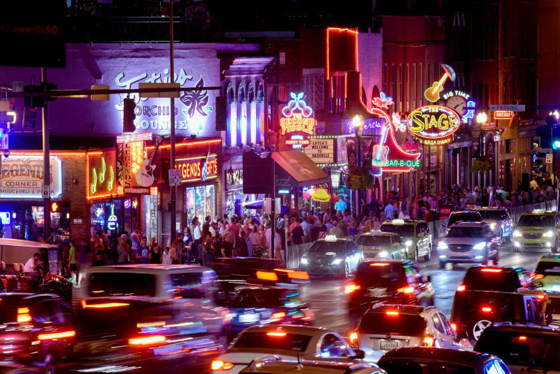 Nashville tennessee broadway street neon signs Colorful neon signs on Nashville's Broadway entertainment district at night