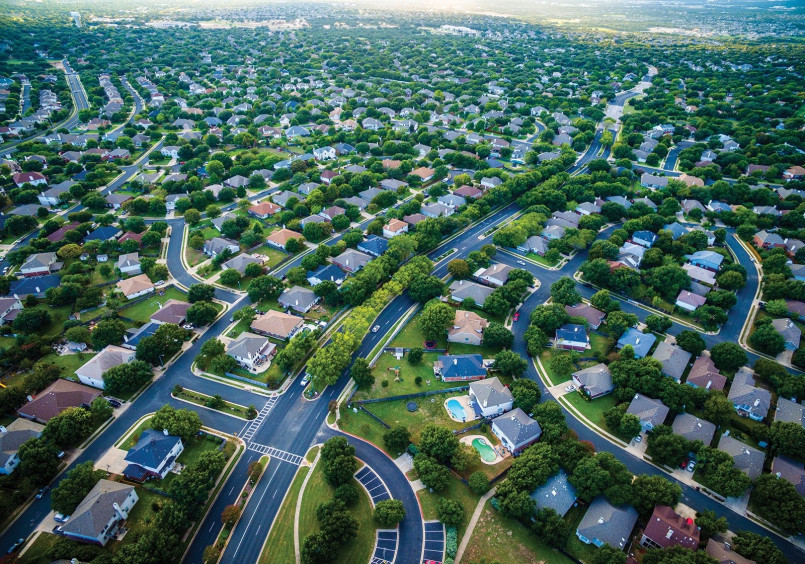 New housing developments stretching across the landscape in Austin, Texas