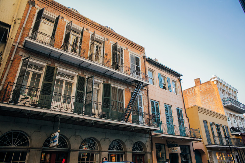 New Orleans French Quarter historic buildings Colorful historic buildings with wrought-iron balconies in the French Quarter