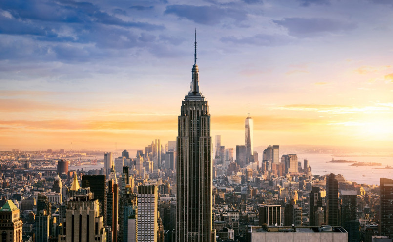 New York City skyline featuring the Empire State Building at sunset