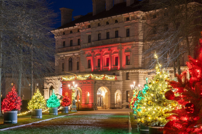 Newport Rhode Island mansion Christmas decorations Grand hall of The Breakers mansion in Newport decorated with elegant Christmas trees and period decorations