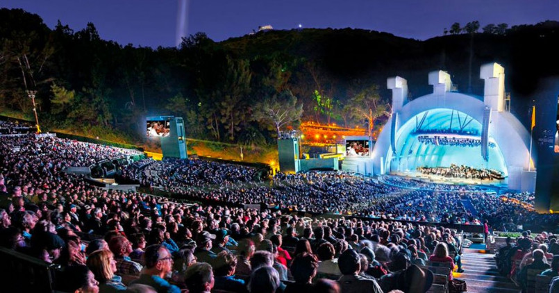 Los angeles hollywood bowl concert Nighttime concert at the Hollywood Bowl amphitheater with illuminated stage and large audience
