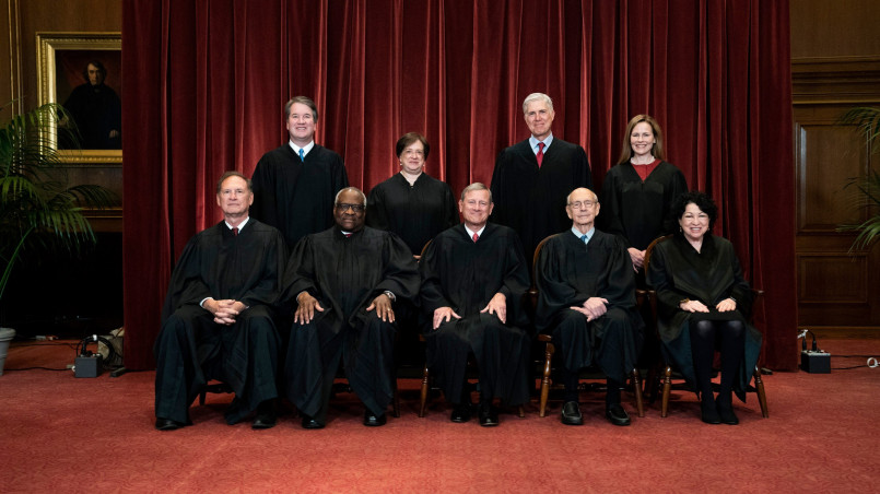 Supreme Court justices on bench during session Nine Supreme Court justices seated in 2025