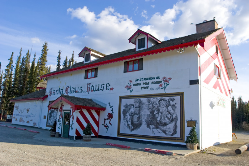 North Pole Alaska Santa Claus House The iconic Santa Claus House in North Pole, Alaska decorated for Christmas with snow and colorful lights