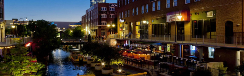 Oklahoma City's Bricktown canal district with pedestrians and restaurants