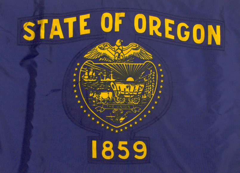 Oregon state flag with state seal and beaver reverse