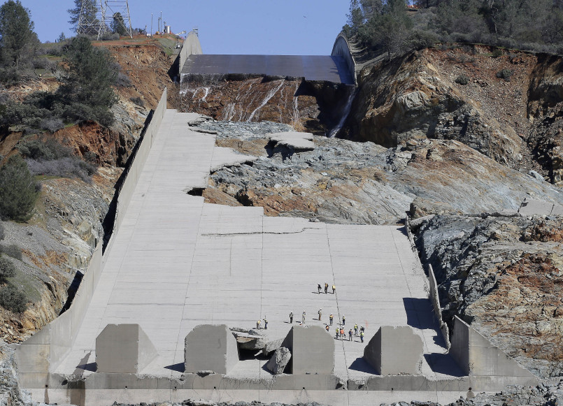 Oroville Dam emergency spillway with water flowing during 2017 crisis