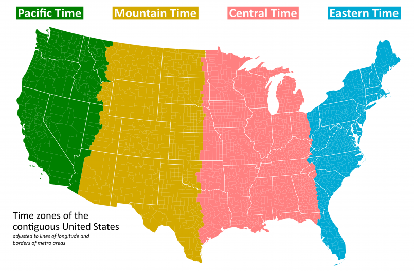 People crossing time zone boundary Sign showing the boundary between Eastern and Central time zones with people crossing