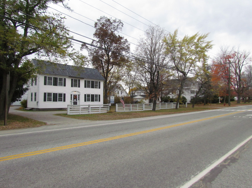 Well-preserved historic main street with brick buildings and vintage storefronts