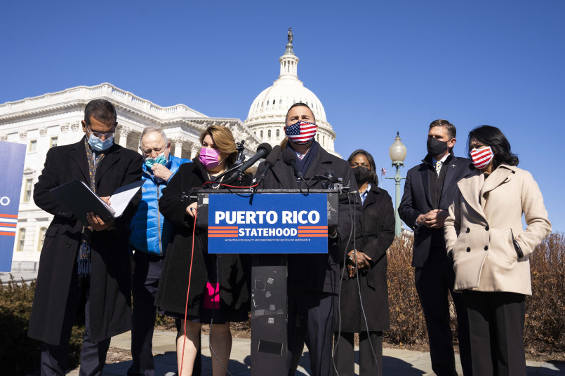 Puerto Rico and US flags flying at government capitol building
