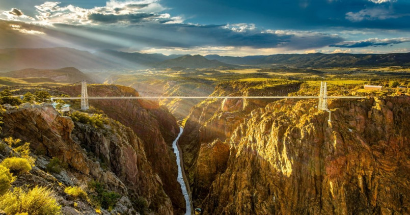 Royal Gorge Bridge spanning across deep canyon with Arkansas River below