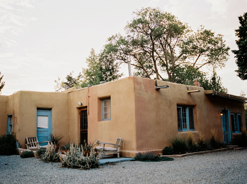 Santa Fe adobe architecture New Mexico Traditional adobe buildings with vigas and turquoise details in Santa Fe's historic district