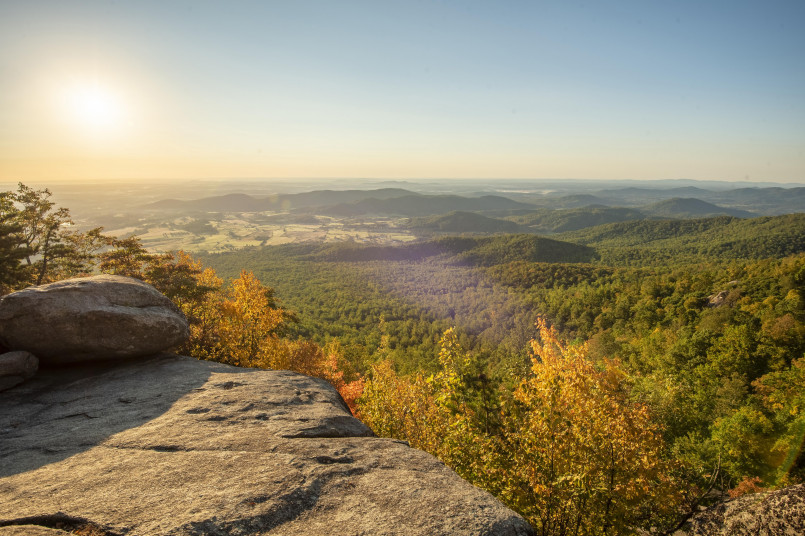 Shenandoah National Park autumn hiking trail Hikers on ridgeline trail with colorful fall foliage views in Shenandoah National Park