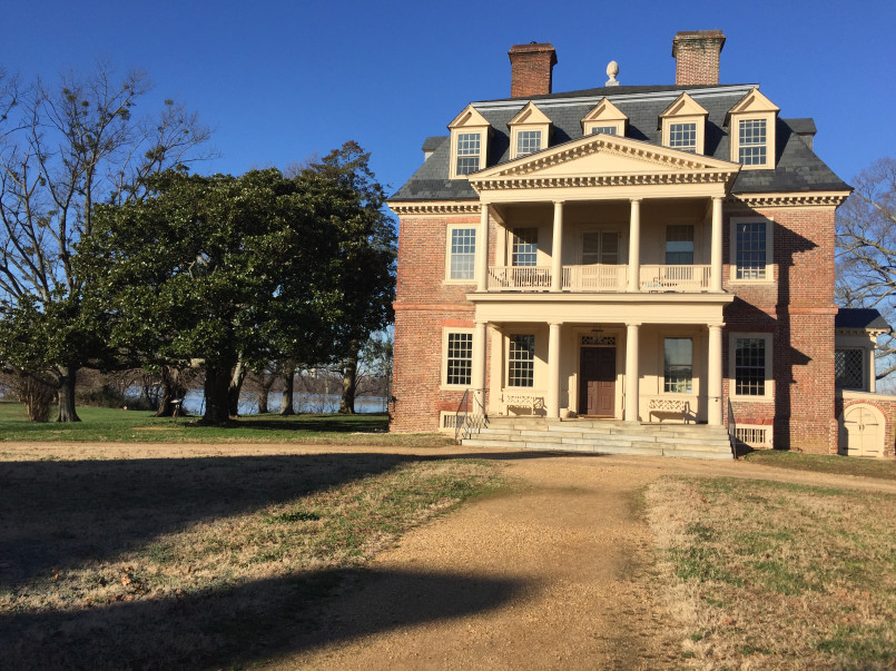 Georgian-style brick mansion with symmetrical windows at Shirley Plantation