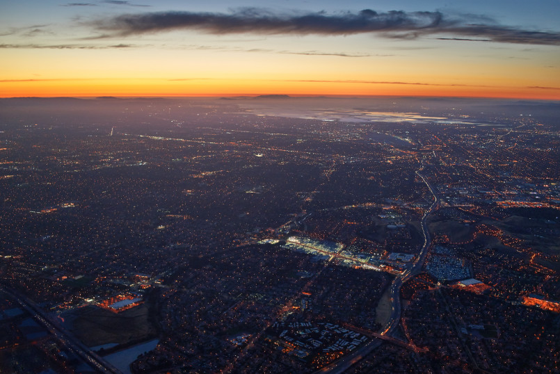Silicon Valley San Jose aerial view Aerial view of San Jose cityscape with tech company headquarters and suburban neighborhoods