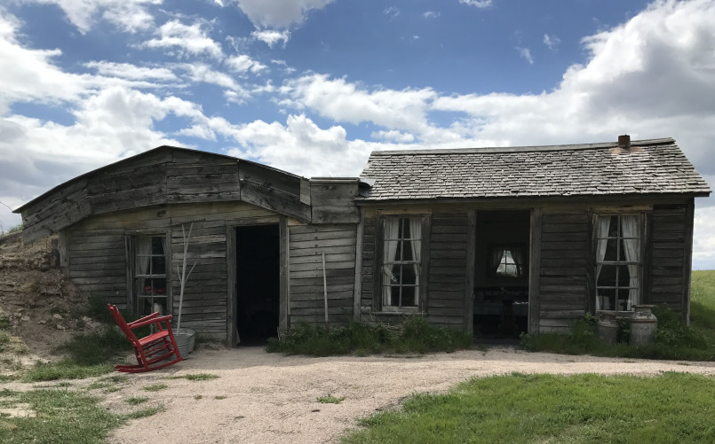 Sod house prairie homestead 1800s Pioneer sod house on the Great Plains showing typical homestead dwelling