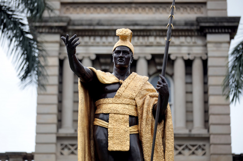 Statue of King Kamehameha I in Honolulu, draped in traditional lei offerings