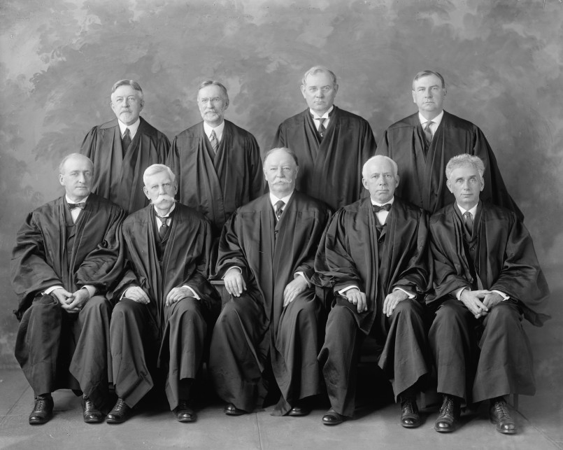 Supreme court justices historical photo Historical black and white photograph of Supreme Court justices from the early 20th century