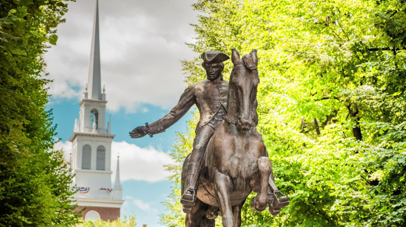 The Freedom Trail in Boston with the Paul Revere statue and Old North Church in the background