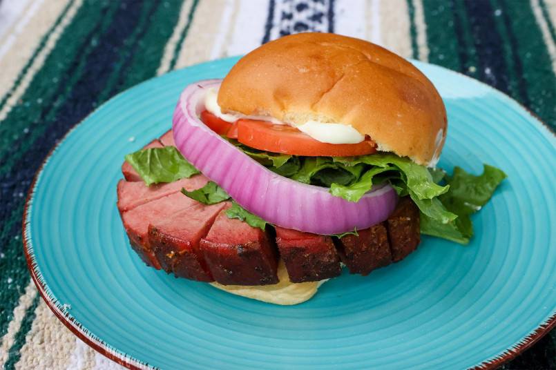 Oklahoma smoked bologna sandwich Thick-sliced smoked bologna sandwich with sauce and pickles