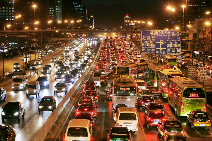 Traffic congestion in growing city Heavy traffic on expanded highway in a rapidly growing metropolitan area