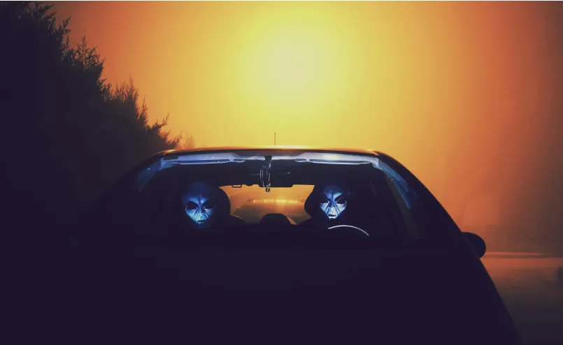 Mysterious aircraft silhouette at high altitude during sunset