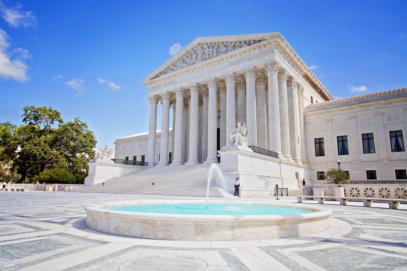 The facade of the United States Supreme Court building with columns