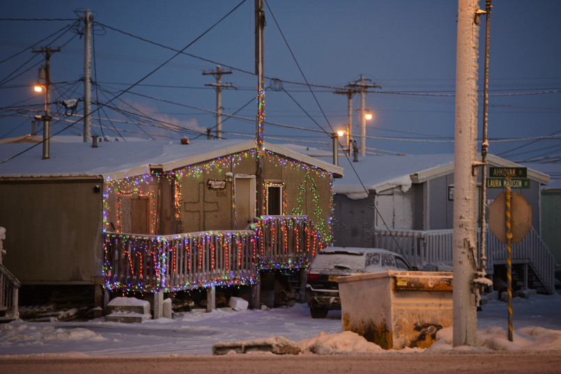 Utqiagvik Alaska winter street scene Snow-covered street in Utqiagvik with buildings constructed for Arctic conditions
