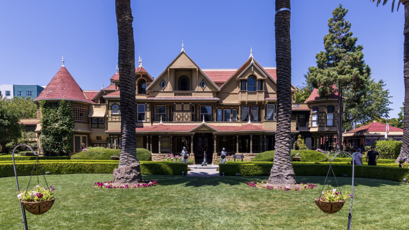 Winchester Mystery House exterior Victorian mansion with complex architecture featuring multiple towers and gables