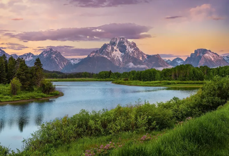 Wyoming grand teton landscape Scenic view of Wyoming's Grand Teton mountains with open plains in the foreground