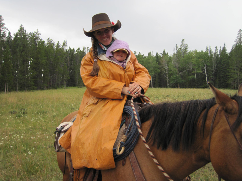 Wyoming rancher on horseback working cattle on open range