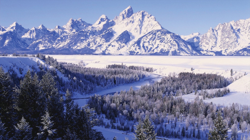 Snow-covered Wyoming mountains and plains during harsh winter conditions