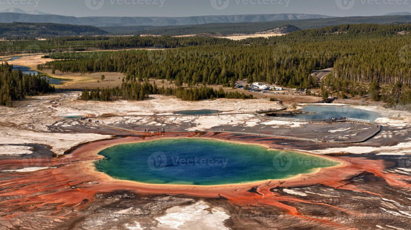 Vibrant aerial view of the Grand Prismatic Spring in Yellowstone National Park with its rainbow-colored rings