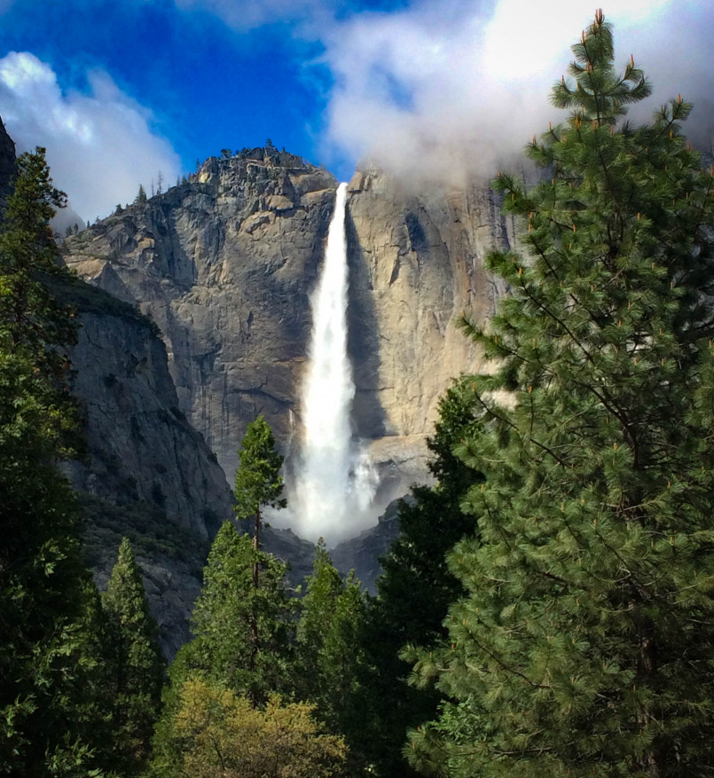 Yosemite Falls at peak flow during spring with rainbow