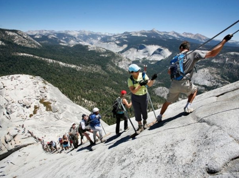 Yosemite Half Dome cables hiking Hikers ascending the cables on Half Dome in Yosemite National Park